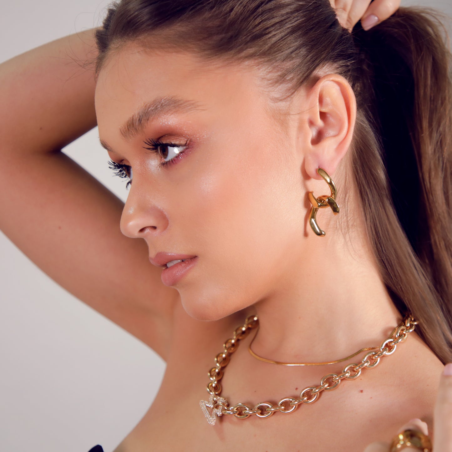 stone paved necklace gold with linked chain earrings